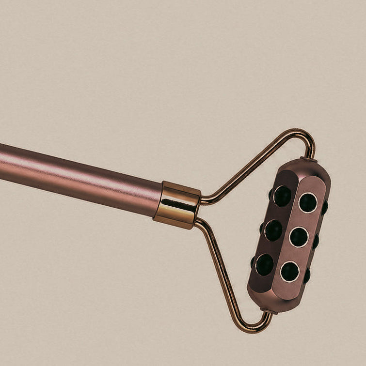 The Stainless Steel Germanium Skin Trainer + Rose Gold Germanium Skin Roller
